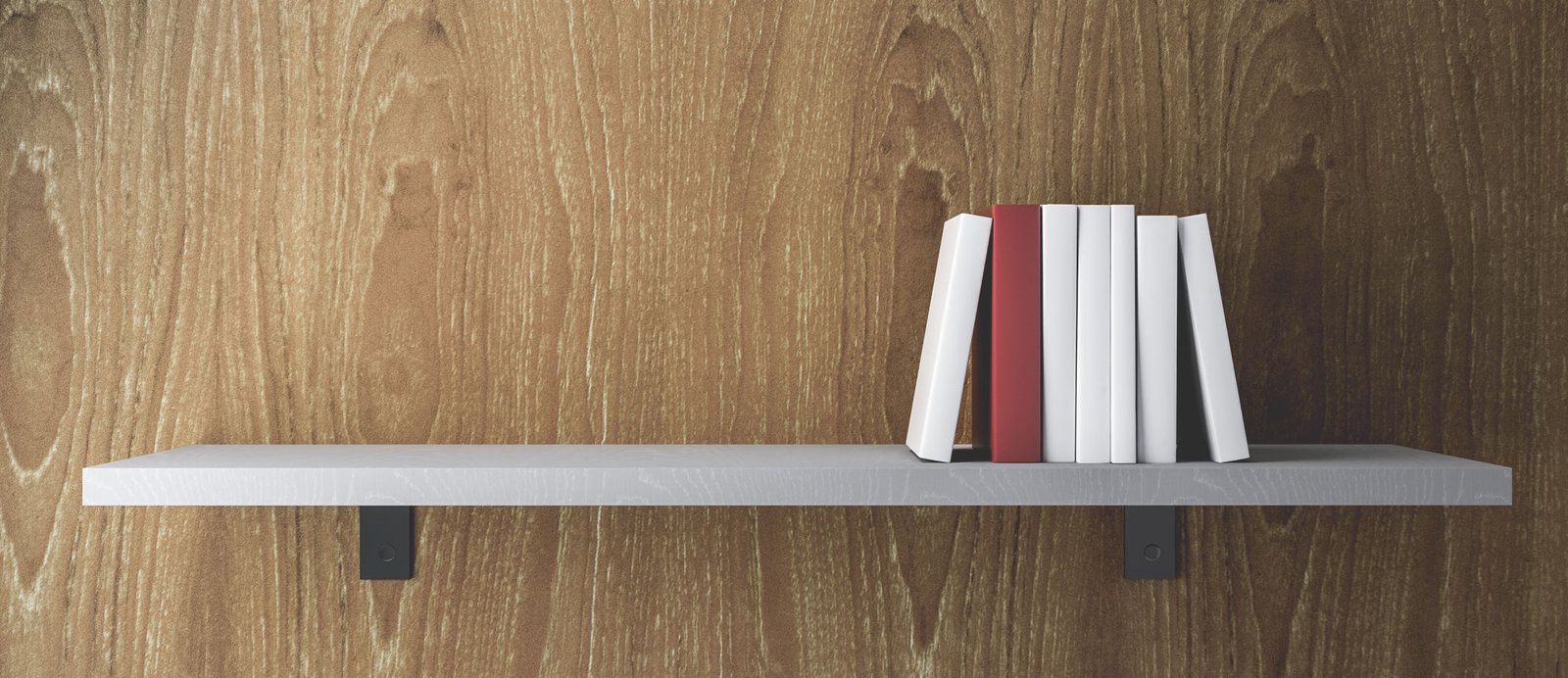 Un libro rojo destacando en una estantería de libros blancos, simbolizando cómo un autor puede sobresalir al dominar una categoría de nicho en Amazon.